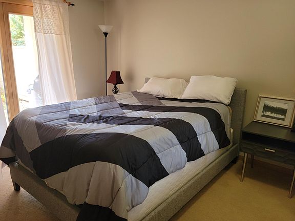 Queen bedroom, french doors to patio & garden