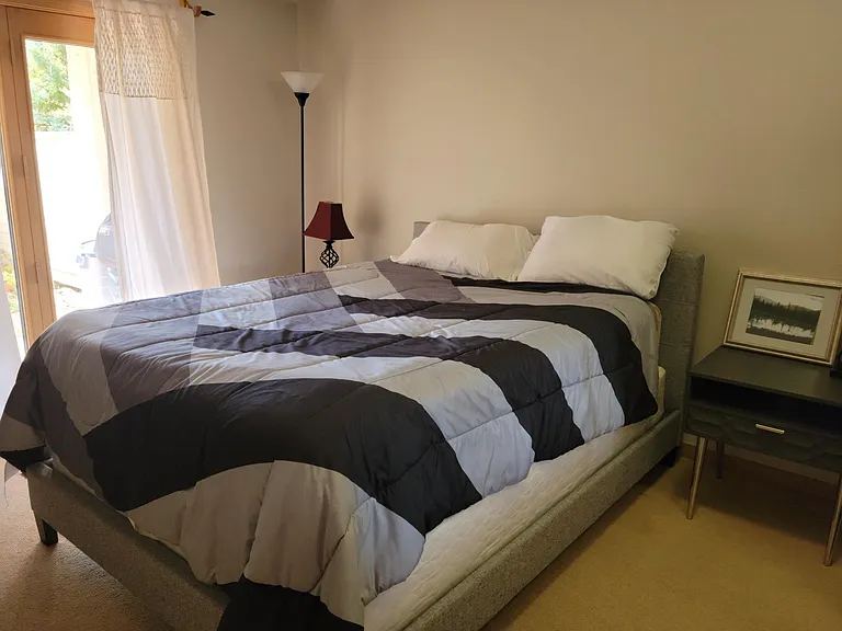 Queen bedroom, french doors to patio & garden