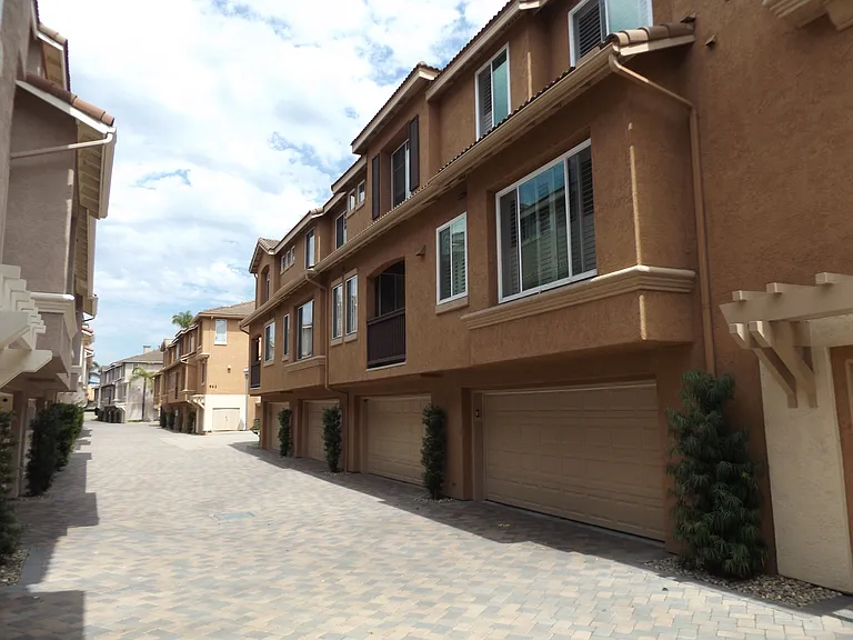 Looking eastward down the drive aisle leading to Unit 64 garage