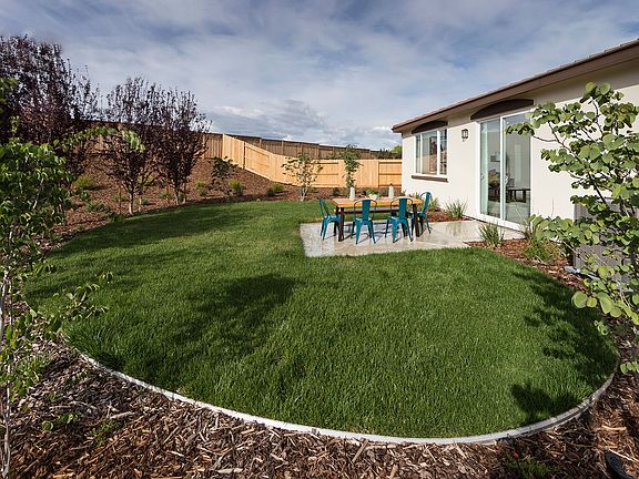 Residence 1 backyard exterior modeled at a nearby Meritage community.