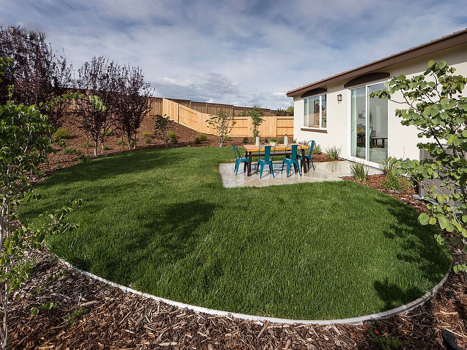 Residence 1 backyard exterior modeled at a nearby Meritage community.