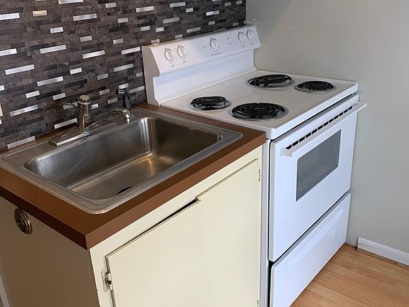Kitchen (Flooring has been updated to match the new floor in the bathroom)