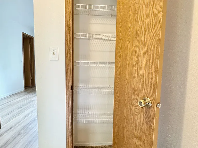 Linen closet at top of stairs.