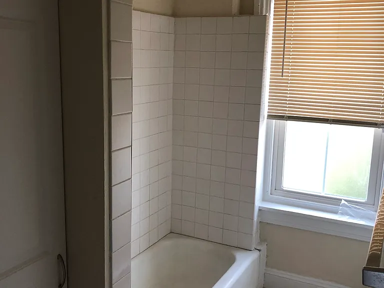 Bathroom with tub and shower