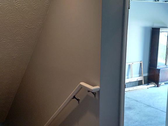 Entryway garage door and stairwell