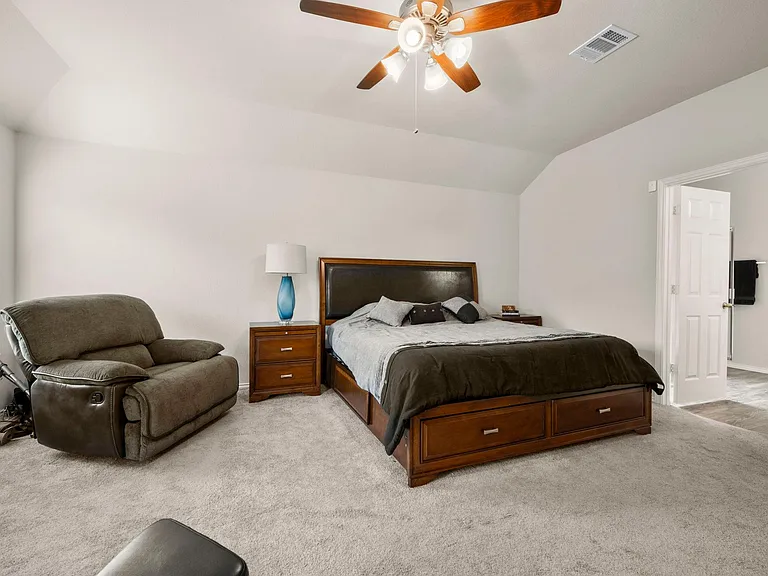 LOTS OF SPACE FOR A BEDROOM SET PLUS EXERCISE SPACE, OR CHAIRS, CREATING A BEDROOM SUITE!