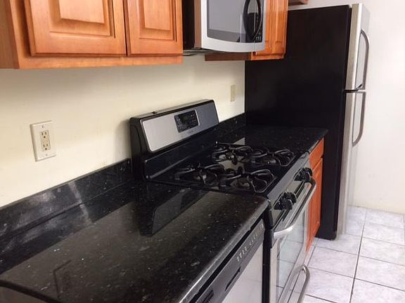 kitchen counter along 1 wall