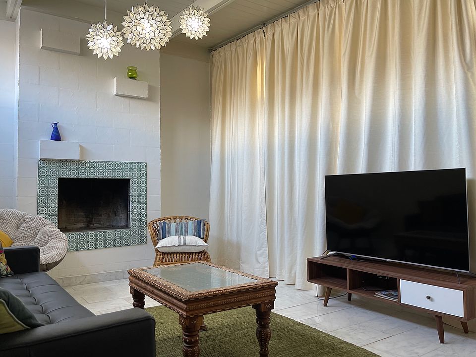 Living room with curtains closed.
