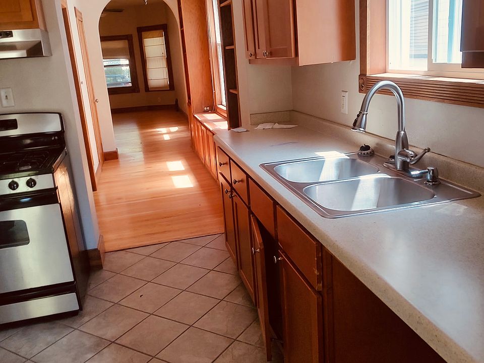 Kitchen and view of hallway to Living Room