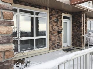 109 Rockyledge Vw NW #1A, Calgary, AB T3G 5X1