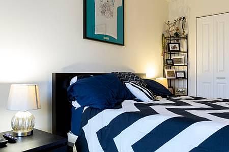 Bedroom with walk-in closet