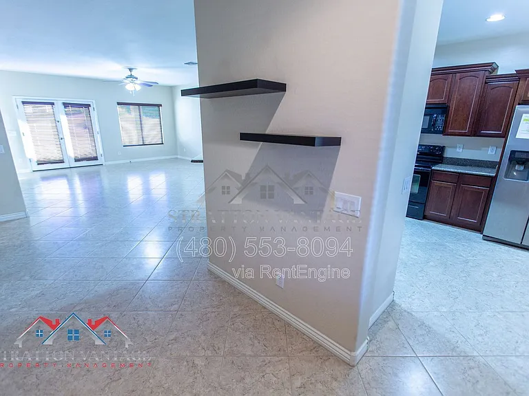 11751 W Daley Ln — Photo 8
