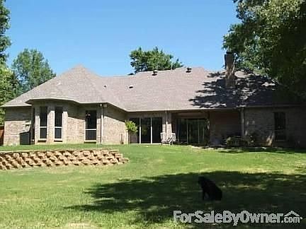 View of back of home
						:
						Perfect patio for cooking out & relaxing on the flagstoned area in the sun