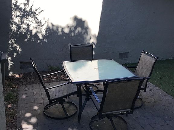 Outdoor patio in fenced yard