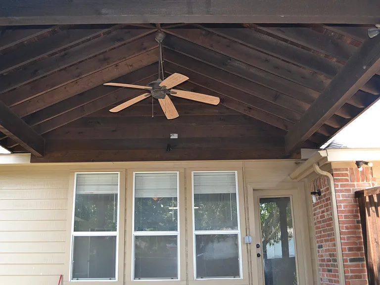 Large covered patio in the backyard.