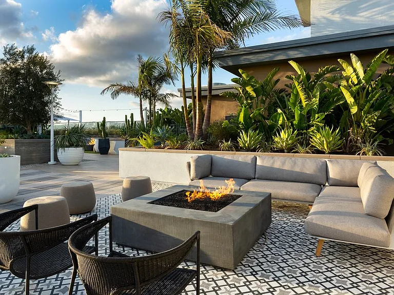 Building B rooftop with fireplace and lounge seating