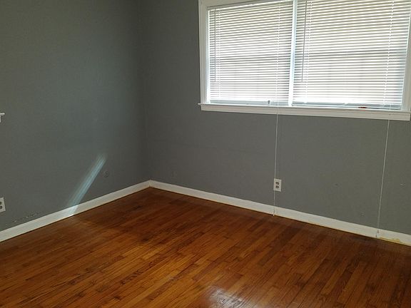 Main bedroom with access to half bathroom.