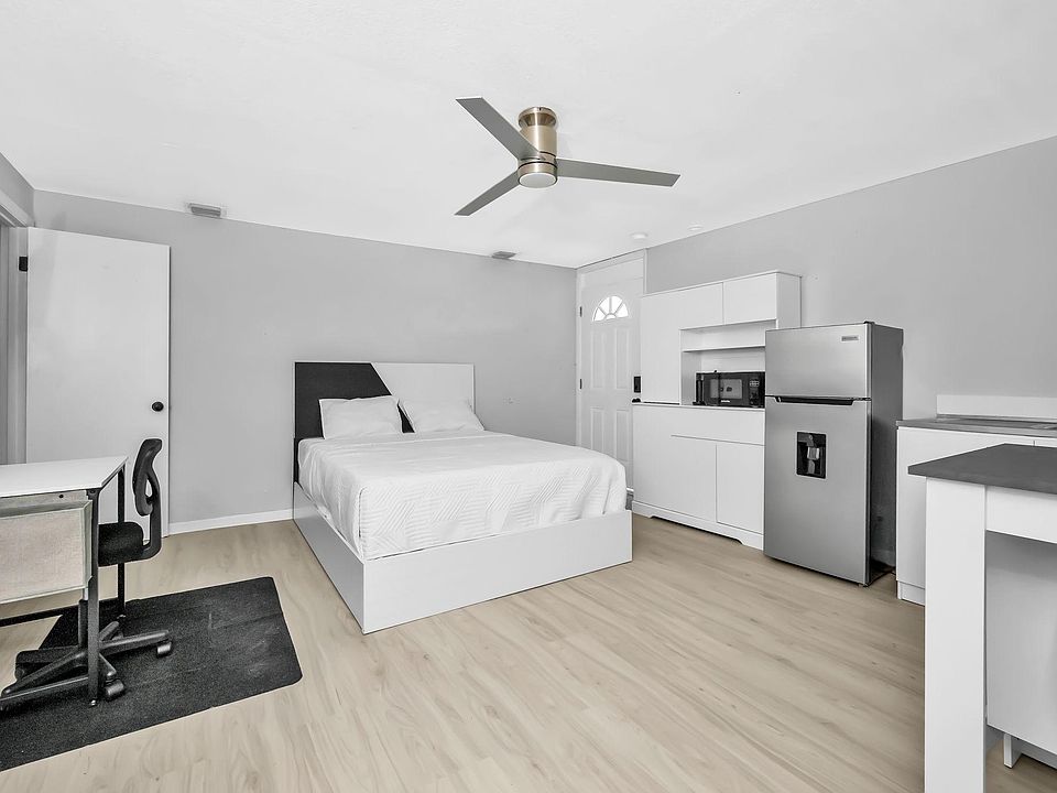 BED 1 WITH EN SUITE ATTACHED BATH WALK IN CLOSET KITCHENETTE & PRIVATE ENTRANCE