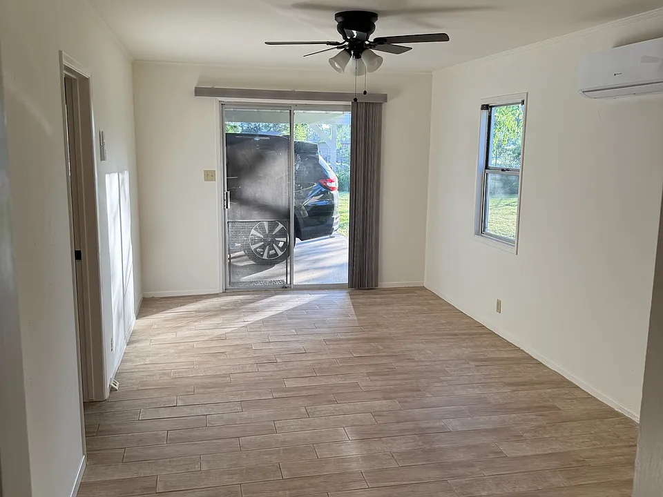 Living room (brand new sliding glass door not pictured*)