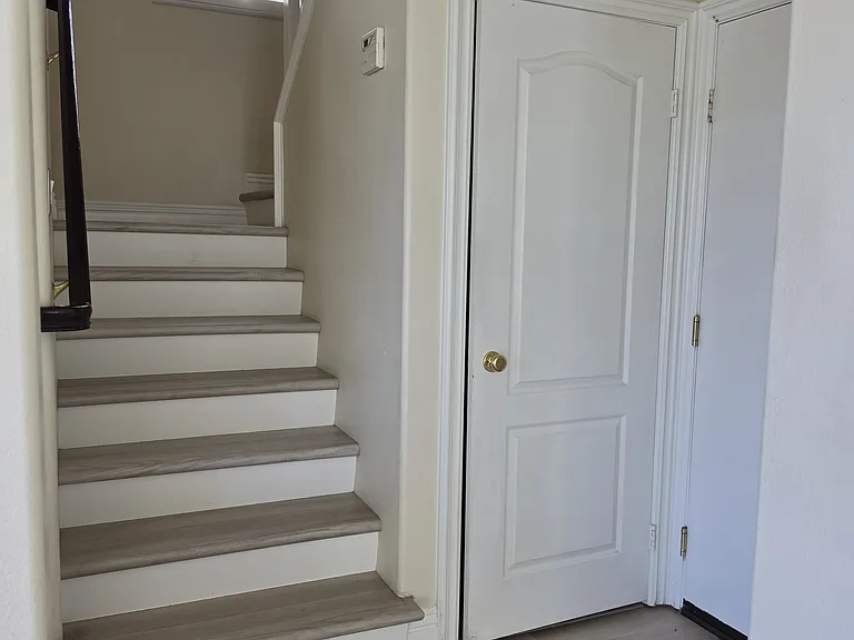 Understairs Storage (Left Door) - Garage Door (Right Door)