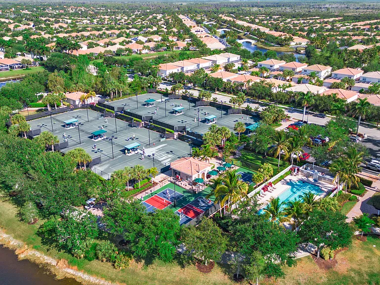 One Half of Village Walk Sports Complex: Tennis and Pickle Ball Courts and Lap Pool. Fully equipped Fitness Center partially pictured at right.