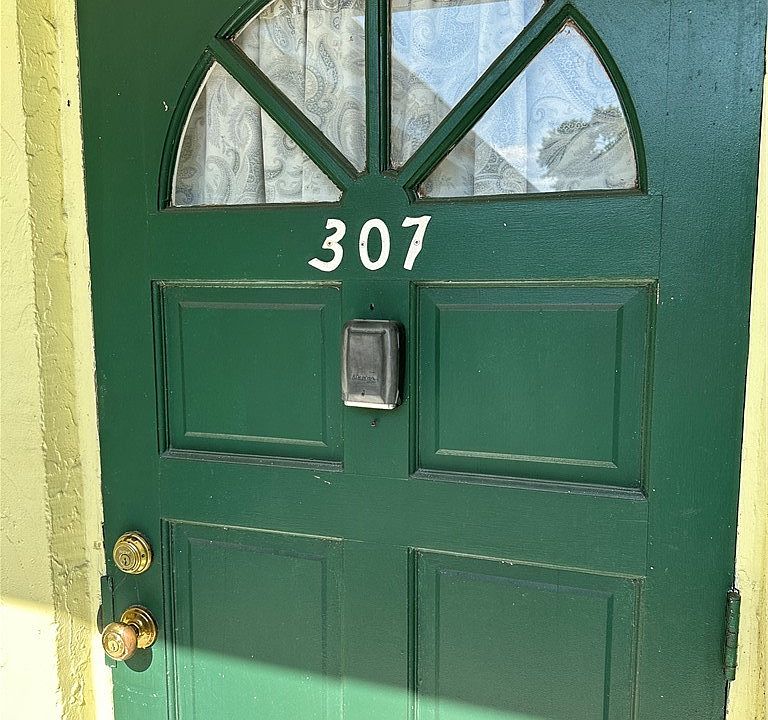 1st image of 307 Golf Villas Ct NW