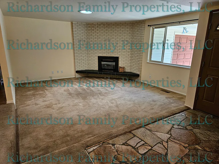 sunken living room and gas fireplace