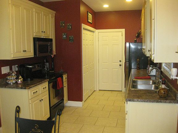 Kitchen looking at garage. HUGE pantry