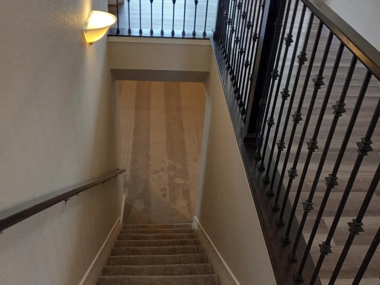 Looking downstairs. Shaw LVP upstairs, carpet down.