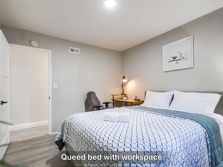 You'll find a cozy queen bed in Bedroom 2 & a nearby workspace for productivity