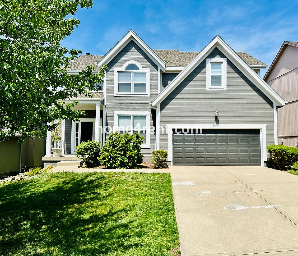 Spacious, 2 Story Home in Blue Valley Schools w/ Updated Kitchen, Fenced Yard, and a Finished Bas... — Photo 1