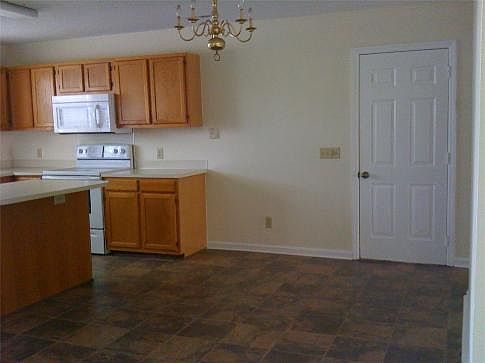 Lots of room for table and chairs plus counter for stools