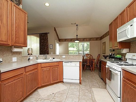 EASY ENTERTAINING WITH THIS OVERSIZED KITCHEN!