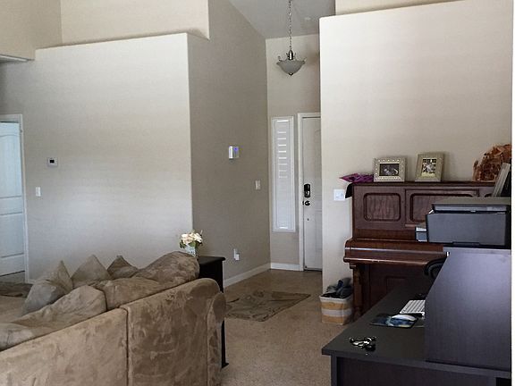 View facing front door from living room