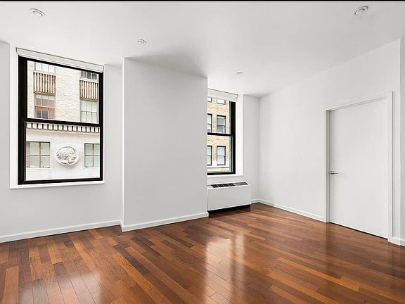 4th image of 1 Wall Street Ct #Penthouse 9