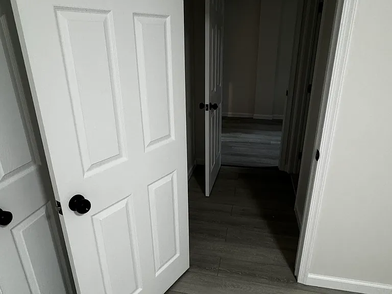 Bedroom 1 Door, leading to Hall Bathroom.