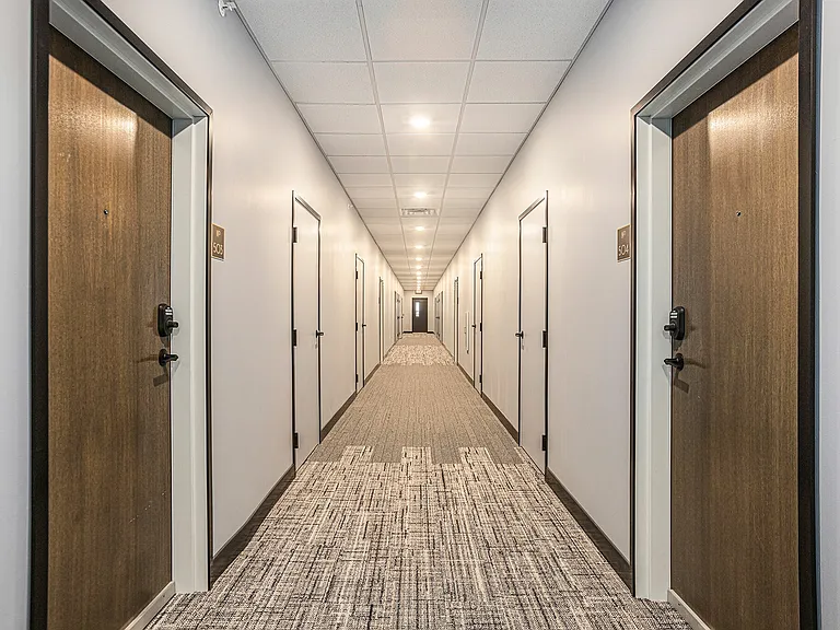 The Tribune Lofts - Hallway with Keyless entry