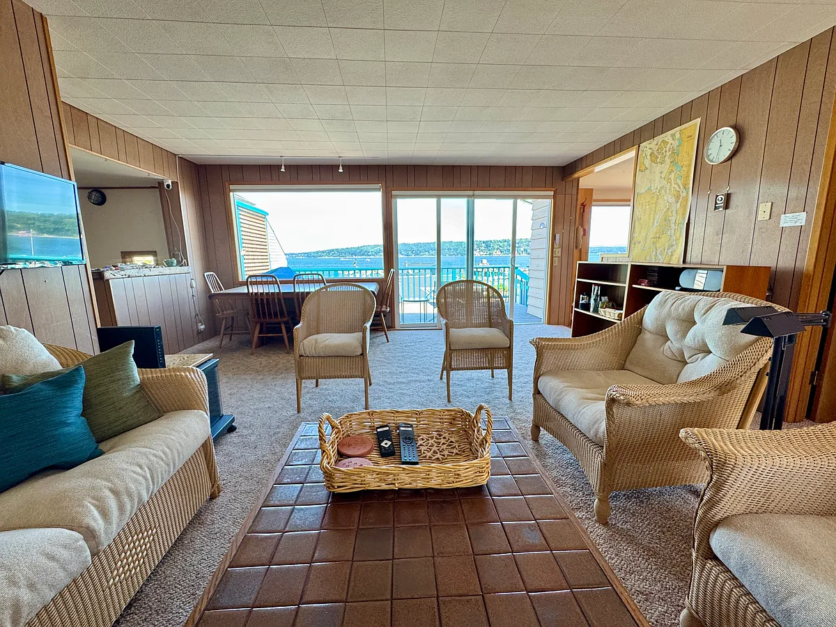 Living room with couch and chairs for reading, conversation, and relaxing - 4341 Wateredge Dr