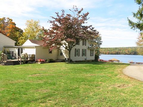 Back of house showing deck