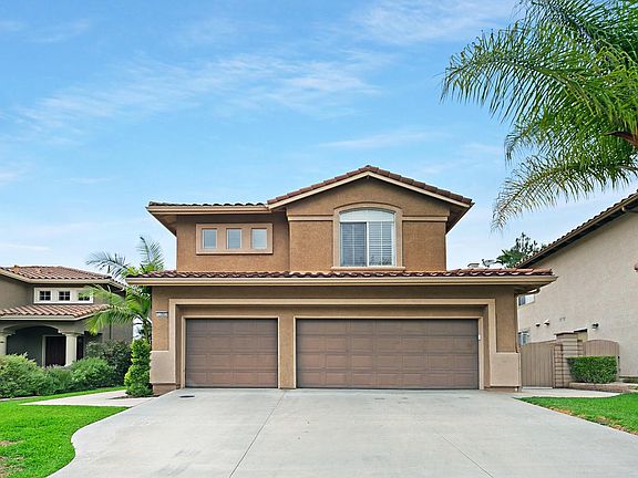 3-Car Garage with full driveway.