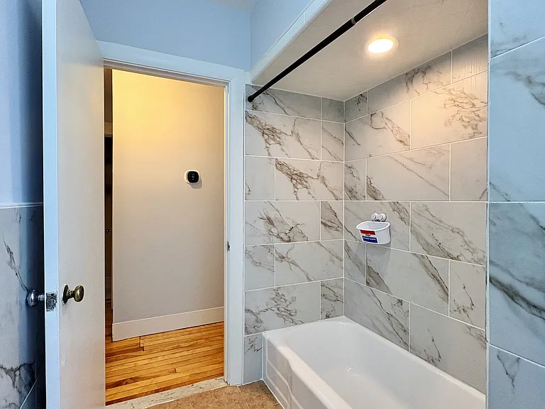 Full bath with tub