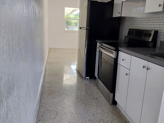 Kitchen with new appliances and renovated counters