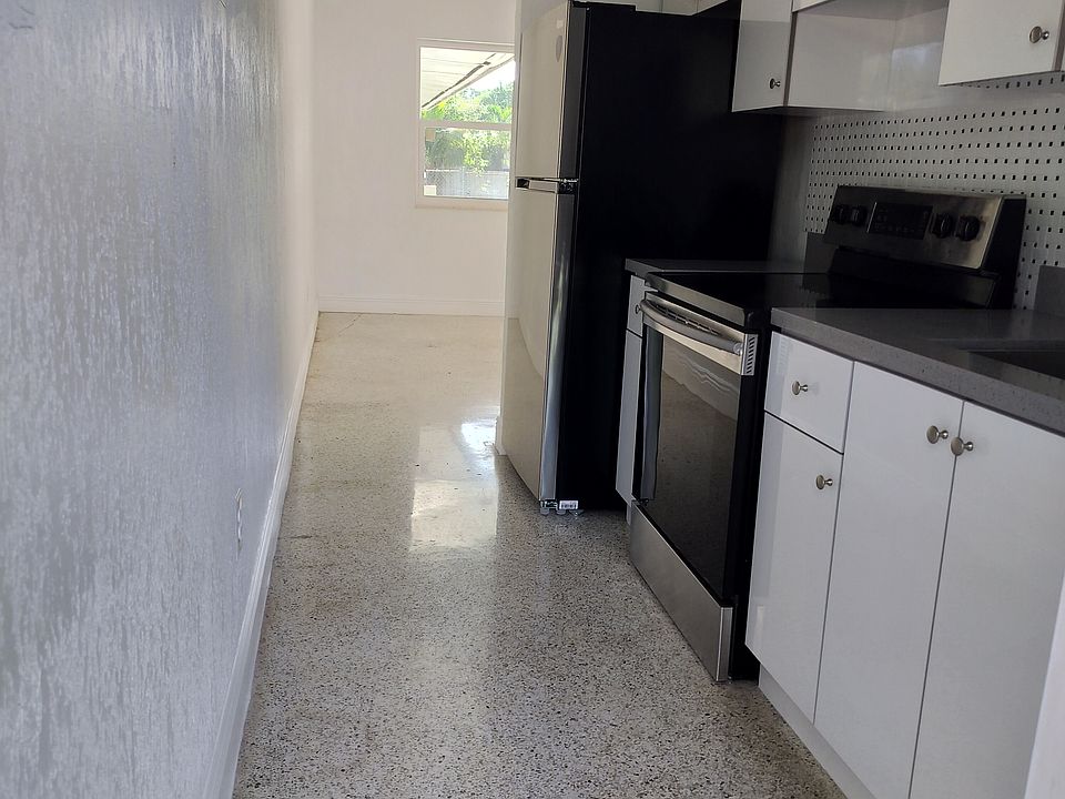 Kitchen with new appliances and renovated counters