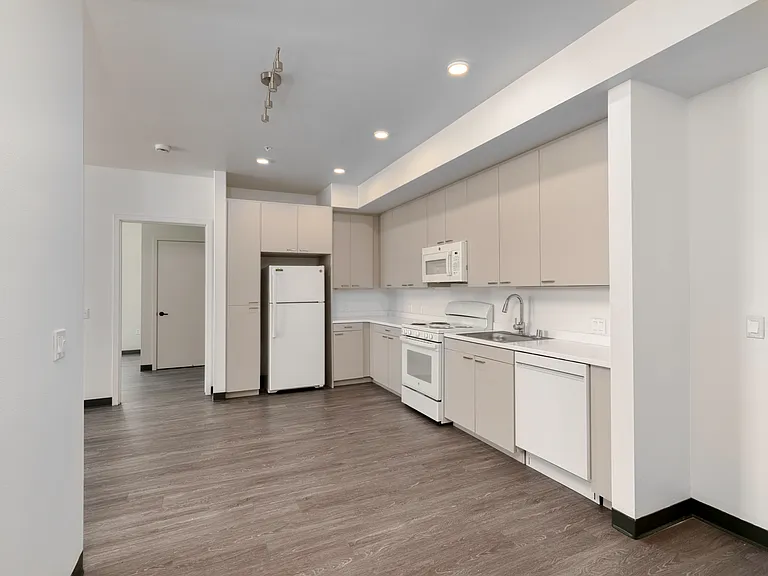 Spacious kitchen with full-size appliances and plenty of space to cook and gather.