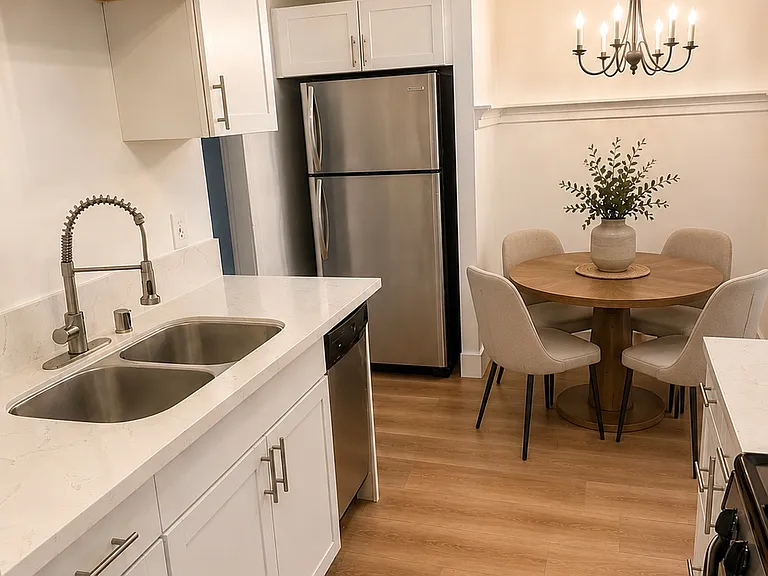 Kitchen with breakfast nook (stainless steel fridge/dishwasher/stove/microwave and deep sink)