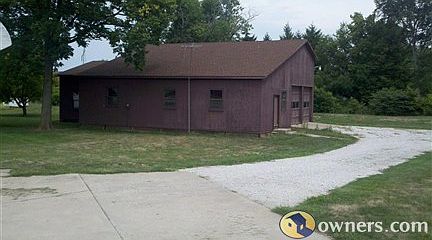 Property Includes Detached Shop Out-Building