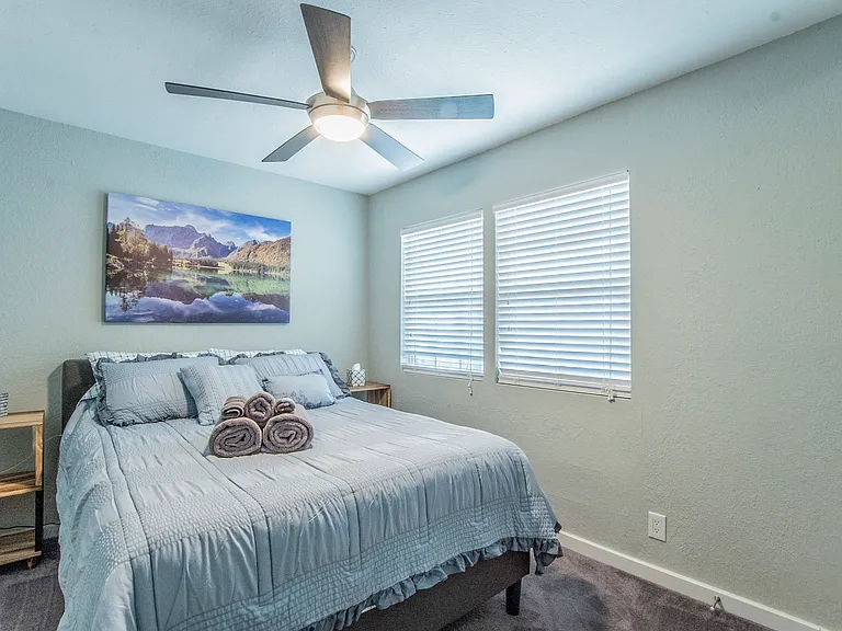 Second furnished room with full-size bed