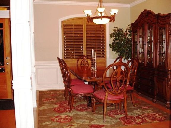 Elegant trim; hardwood floor.