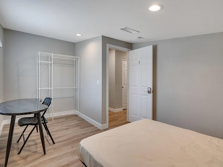 Room 7, wardrobe, looking out to hallway