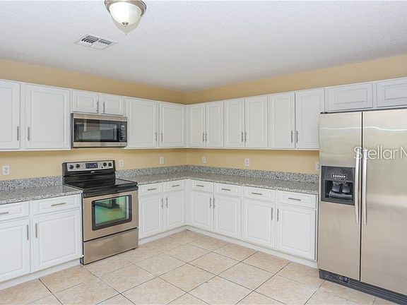 4th image of 1372 Epson Oaks Way